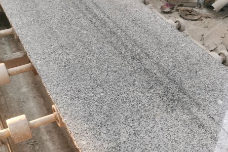 廣東芝麻白光面大板